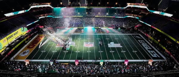 Philadelphia Eagles players enter the stadium for Super Bowl 59 Opening Night, Monday, Feb. 3, 2025, in New Orleans, ahead of the NFL football game between the Philadelphia Eagles and the Kansas City Chiefs Sunday. (AP Photo/David J. Phillip)