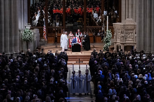 The flag-draped casket of former President Jimmy Carter is pictured before being carried out following a state funeral at the National Cathedral, Thursday, Jan. 9, 2025, in Washington. (Haiyun Jiang/The New York Times via AP, Pool)