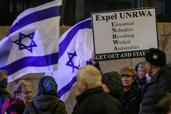 FILE - People protest against aid agency known as UNRWA in Jerusalem, Monday, Feb. 5, 2024. (AP Photo/Mahmoud Illean, File)