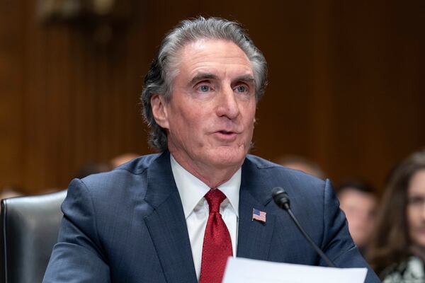 Former Gov. Doug Burgum, President-elect Donald Trump's choice to lead the the Interior Department as Secretary of the Interior, testifies before the Senate Energy and Natural Resources Committee on Capitol Hill in Washington, Thursday, Jan. 16, 2025. (AP Photo/Jose Luis Magana)