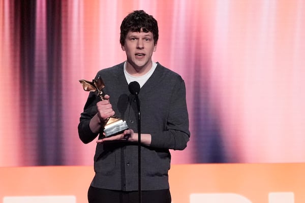 Jesse Eisenberg accepts the award for best screenplay for "A Real Pain" during the Film Independent Spirit Awards on Saturday, Feb. 22, 2025, in Santa Monica, Calif. (AP Photo/Chris Pizzello)