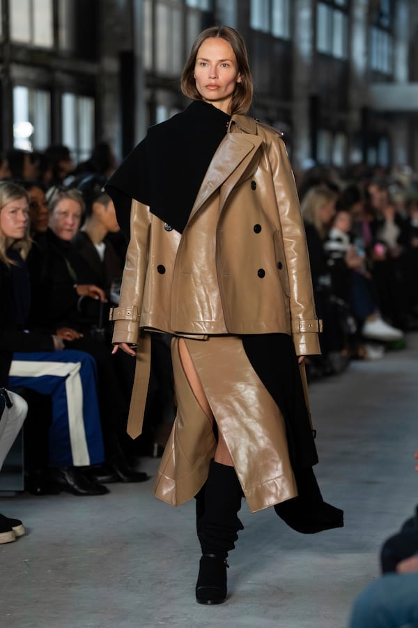 A model wears a creation as part of the Sacai Fall/Winter 2025-2026 Womenswear collection presented in Paris, Monday, March 10, 2025. (Photo by Scott A Garfitt/Invision/AP)