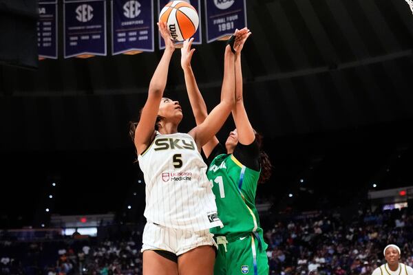 Chicago Sky forward Angel Reese (5) shoots against Brazil forward Manu Alves (21) in the second half a WNBA exhibition basketball game in Baton Rouge, La., Friday, May 2, 2025. (AP Photo/Gerald Herbert)