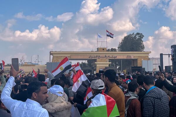 Hundreds of Egyptians gather in front of the Rafah border crossing between Egypt and the Gaza Strip, to show solidarity with the Palestinians and to reject the proposed displacement plans, Friday, Jan. 31, 2025. (AP Photo/Mohammed Arafat)