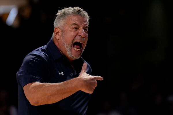 Auburn head coach Bruce Pearl yells to the bench during the first half of an NCAA college basketball game against Vanderbilt, Tuesday, Feb. 11, 2025, in Nashville, Tenn. (AP Photo/George Walker IV)