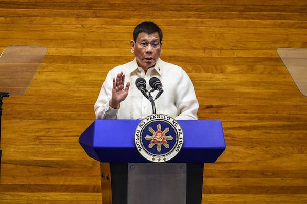 FILE - Philippine President Rodrigo Duterte gestures as he delivers his final State of the Nation Address at the House of Representatives in Quezon City, Philippines on July 26, 2021. (Jam Sta Rosa/Pool Photo via AP, File)