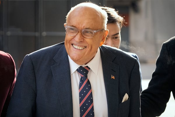 Rudy Giuliani arrives at federal court in Washington, Friday, Jan. 10, 2025. (AP Photo/Mark Schiefelbein)