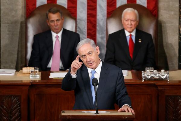 FILE - Israeli Prime Minister Benjamin Netanyahu gestures while speaking before a joint meeting of Congress on Capitol Hill in Washington, March 3, 2015. (AP Photo/Andrew Harnik, File)