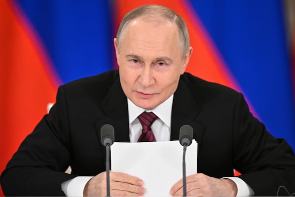 Russian President Vladimir Putin gestures as he speaks to journalists in the Grand Palace at the Kremlin in Moscow, Russia, Sunday, May 11, 2025, after celebrations of the 80th anniversary of the Soviet Union's victory over Nazi Germany during World War II. (Sergei Bobylev/Photo host agency RIA Novosti via AP)