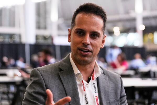 Al Makke, Director of Engineering at Schaeffler Group USA, gestures during an interview at the Robotics Summit & Expo, Wednesday, April 30, 2025, in Boston. (AP Photo/Charles Krupa)