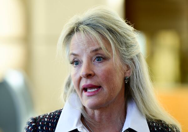 Tamara Dean Harney speaks to the media at the Jefferson County Government Center after former Colorado Bureau of Investigation scientist Yvonne Woods' first court appearance Thursday, Jan, 23, 2025, in Golden, Colo. (Andy Cross/The Denver Post via AP)