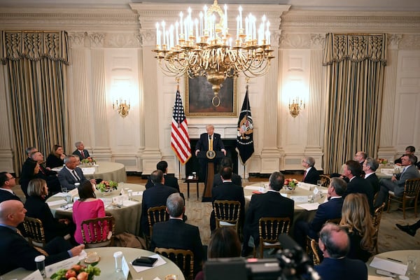 President Donald Trump speaks at the Governors Working Session in the State Dining Room of the White House in Washington, Friday, Feb. 21, 2025. (Pool via AP)