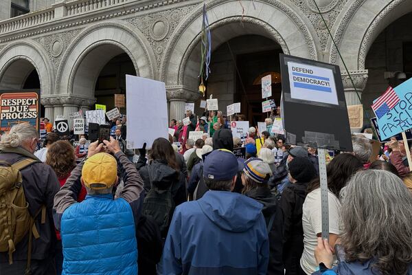 Supporters of Judge Hannah Dugan protest outside the United States Federal Building and Courthouse in Milwaukee, Wis. on Thursday, April 15, 2025 ahead of Dugan's arraignment on charges that she helped a man in the country illegally evade arrest by immigration authorities. (AP Photo/Todd Richmond)
