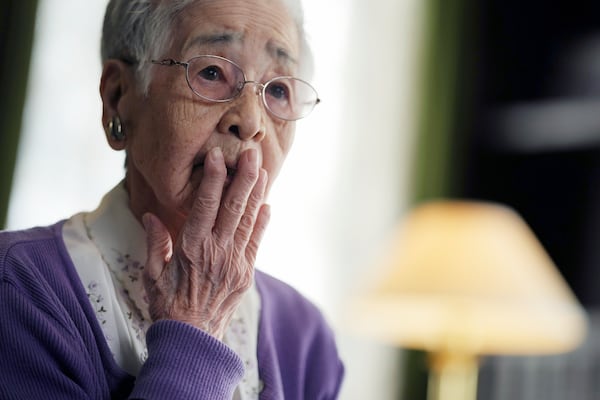 Reiko Muto, 97-year-old, former nurse student speaks on her experience with The Associated Press on Feb. 18, 2025, at St Luke's International Hospital in Tokyo. (AP Photo/Eugene Hoshiko)