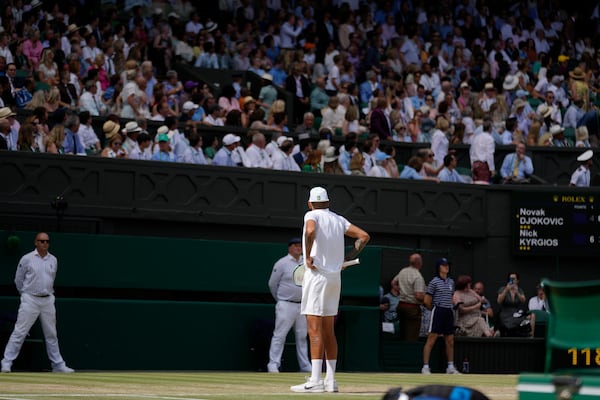 FILE - Australia's Nick Kyrgios shouts at the crowds to get in their seats during the final of the men's singles against Serbia's Novak Djokovic on day fourteen of the Wimbledon tennis championships in London, Sunday, July 10, 2022. (AP Photo/Kirsty Wigglesworth, File)