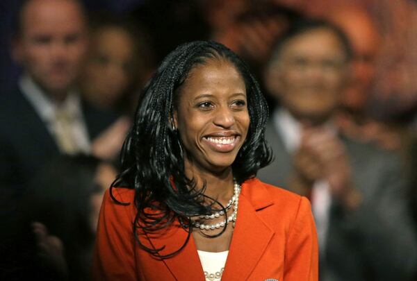 FILE - Mia Love, the Republican nominee in Utah's 4th congressional district, smiles after speaking during a rally in Lehi, Utah, Oct. 8, 2014. (AP Photo/Rick Bowmer, File)