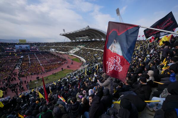 People gather for the funeral ceremony of the Lebanon's late Hezbollah leaders Hassan Nasrallah and Hashem Safieddine at the Sports City Stadium in Beirut, Lebanon, Sunday, Feb. 23, 2025. (AP Photo/Hassan Ammar)