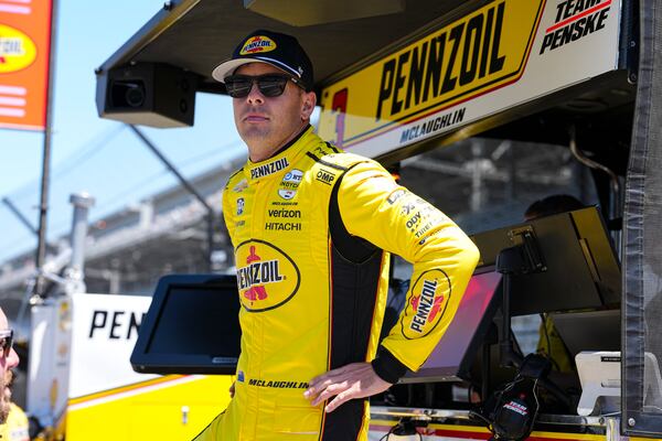 Scott McLaughlin, of New Zealand, waits for the start of practice for the Indianapolis 500 auto race at Indianapolis Motor Speedway in Indianapolis, Sunday, May 18, 2025. (AP Photo/Michael Conroy)