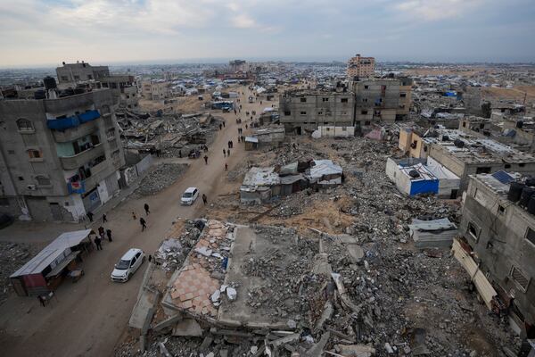 FILE - A tent camp for displaced Palestinians is set up amid destroyed buildings in the Khan Younis refugee camp, southern Gaza Strip, Jan. 4, 2025. (AP Photo/Abdel Kareem Hana, File)