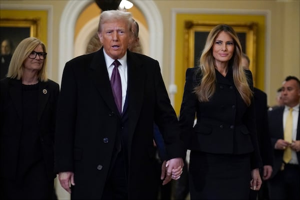 President-elect Donald Trump walks with Melania Trump at the Capitol Wednesday, Jan. 8, 2025, in Washington. (AP Photo/Jose Luis Magana)