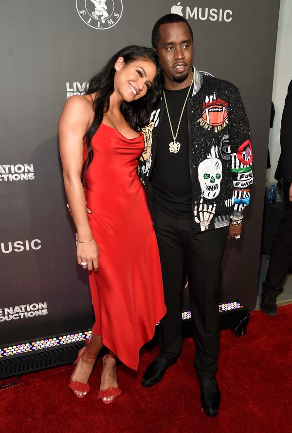 FILE - Cassie Ventura, left, and Sean "Diddy" Combs arrive at the Los Angeles premiere of "Can't Stop, Won't Stop: A Bad Boy Story" at the Writers Guild Theater, June 21, 2017, in Beverly Hills, Calif. (Photo by Chris Pizzello/Invision/AP File)