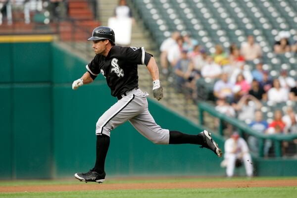FILE - Chicago White Sox's Scott Podsednik steals second base during a baseball game against the Cleveland Indians, June 29, 2009, in Cleveland. (AP Photo/Mark Duncan, File)