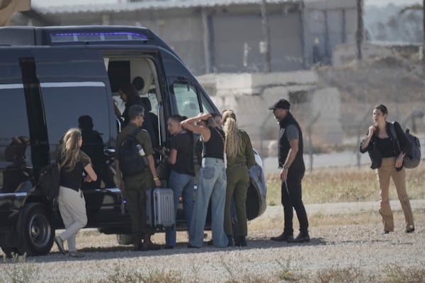 Relatives of Israeli-American soldier Edan Alexander arrive ahead of his scheduled release from Hamas captivity in Gaza, in Reim, near the Gaza border, southern Israel, Monday, May 12, 2025.(AP Photo/Maya Alleruzzo)