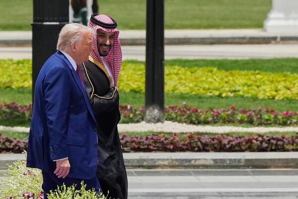 President Donald Trump and Saudi Crown Prince Mohammed bin Salman speak during an arrival ceremony at the Royal Palace in Riyadh, Saudi Arabia, Tuesday, May 13, 2025. (AP Photo/Alex Brandon)