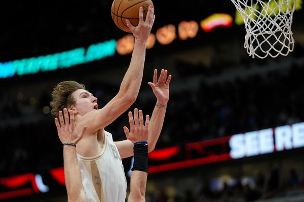 Chicago Bulls forward Matas Buzelis goes to the basket during the first half of an NBA basketball game against the Golden State Warriors, Saturday, Feb. 8, 2025, in Chicago. (AP Photo/Erin Hooley)