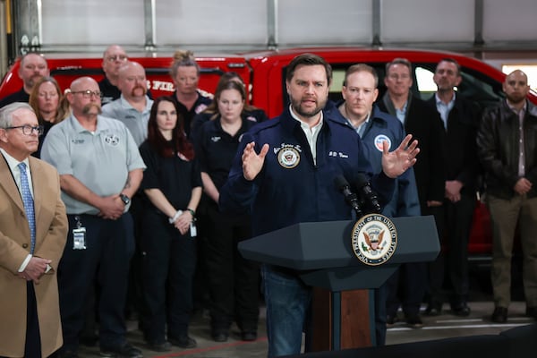 Ohio Gov. Mike DeWine, left, looks on as Vice President JD Vance speaks at the East Palestine Fire Department as he visits East Palestine, Ohio, Monday, Feb. 3, 2025. (Rebecca Droke/Pool Photo via AP)