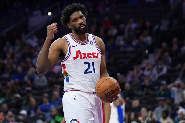 Philadelphia 76ers' Joel Embiid reacts during the first half of an NBA basketball game against the Toronto Raptors, Tuesday, Feb. 11, 2025, in Philadelphia. (AP Photo/Matt Slocum)