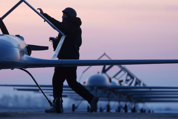 A Ukrainian serviceman of the Defence Intelligence prepares to launch long-range drones An-196 Liutyi in undisclosed location, Ukraine, Feb. 28, 2025. (AP Photo/Evgeniy Maloletka)