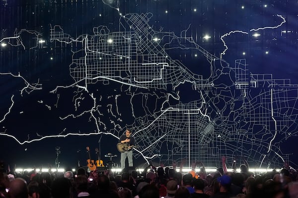 John Mayer performs during the FireAid benefit concert on Thursday, Jan. 30, 2025, at The Forum in Inglewood, Calif. (AP Photo/Chris Pizzello)