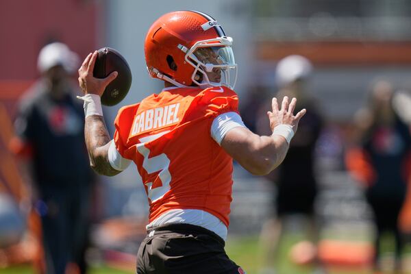 Cleveland Browns quarterback Dillon Gabriel (5) throws during the NFL football team's rookie minicamp in Berea, Ohio, Friday, May 9, 2025. (AP Photo/Sue Ogrocki)