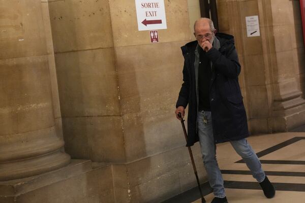 Defendant Aomar Aït Khedache, one of the men accused in the 2016 armed robbery of Kim Kardashian, leaves after the verdict in the trial of Kim Kadashian heist, Friday, May 23, 2025 in Paris. (AP Photo/Christophe Ena)