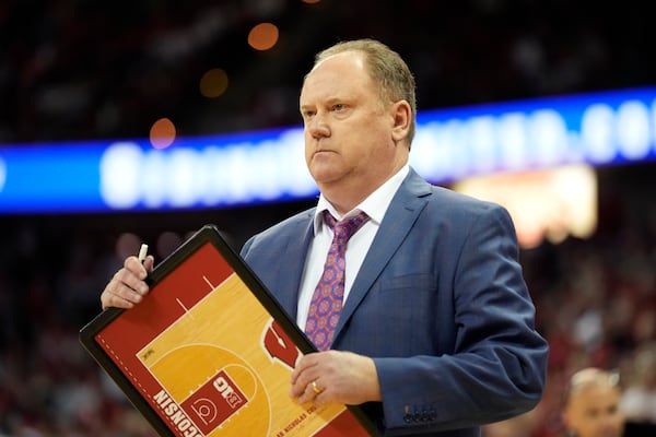 Wisconsin head coach Greg Gard looks out to his players at the start of a timeout against Oregon during the second half of an NCAA college basketball game Saturday, Feb. 22, 2025, in Madison, Wis. (AP Photo/Kayla Wolf)