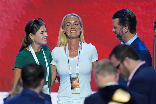 FILE - Vanessa Trump, center, ex-wife of Donald Trump Jr., right, and their daughter Kai Madison, left, on stage during the third day of the Republican National Convention on Wednesday, July 17, 2024, in Milwaukee. (AP Photo/J. Scott Applewhite,File)