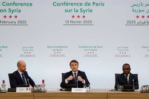 France's President Emmanuel Macron, center, delivers a speech during the International Conference on Syria at the Ministerial Conference Center, in Paris, France, Thursday, Feb. 13, 2025. (Ludovic Marin, Pool Photo via AP)