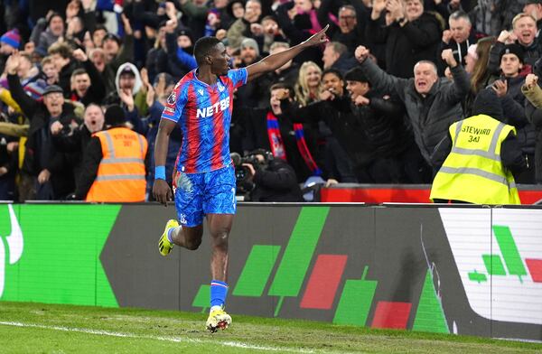 Crystal Palace's Ismaila Sarr celebrates scoring their side's first goal of the game during the English Premier League soccer match between Crystal Palace and Aston Villa at Selhurst Park, London, Tuesday, Feb. 25, 2025. (Zac Goodwin/PA via AP)