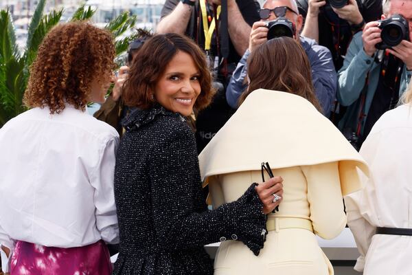 Jury members Leila Slimani, left, and Halle Berry, pose with jury president Juliette Binoche at the jury photo call at the 78th international film festival, Cannes, southern France, Tuesday, May 13, 2025. (Photo by Joel C Ryan/Invision/AP)