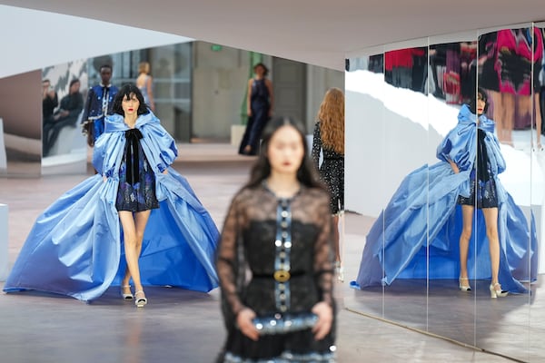 A model wears a creation as part of the Chanel Haute Couture Spring Summer 2025 collection, that was presented in Paris, Tuesday, Jan. 28, 2025. (AP Photo/Lewis Joly).