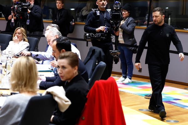 Ukraine's President Volodymyr Zelenskyy, right, arrives for a round table meeting at an EU Summit in Brussels, Thursday, March 6, 2025. (AP Photo/Geert Vanden Wijngaert)