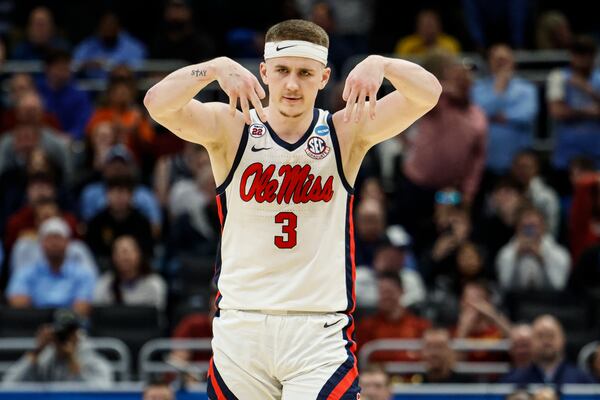 Mississippi guard Sean Pedulla reacts after his 3-point basket against North Carolina in the first round of the NCAA college basketball tournament Friday, March 21, 2025, in Milwaukee. (AP Photo/Jeffrey Phelps)