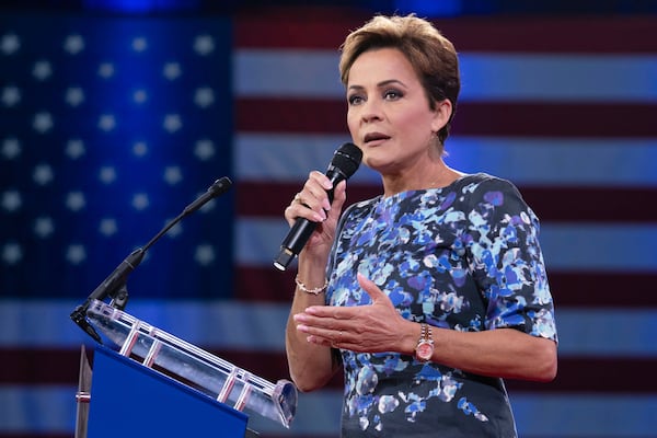 FILE - Kari Lake speaks at the Conservative Political Action Conference, CPAC, at the Gaylord National Resort & Convention Center, Friday, Feb. 21, 2025, in Oxon Hill, Md. (AP Photo/Jose Luis Magana, File)