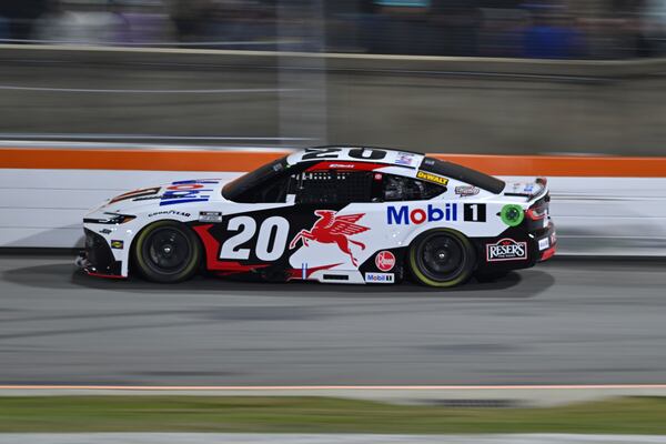 Christopher Bell steers down the front stretch during a NASCAR Cup Series auto race at Bowman Gray Stadium, Sunday, Feb. 2, 2025, in Winston-Salem, N.C. (AP Photo/Matt Kelley)