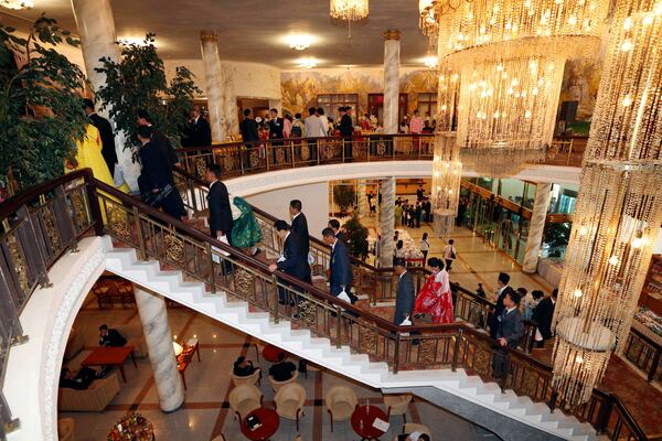 FILE - North Koreans arrive to meet their South Korean relatives during a separated family reunion meeting at the Diamond Mountain resort in North Korea, Tuesday, Aug. 21, 2018. (Korea Pool Photo via AP, File)