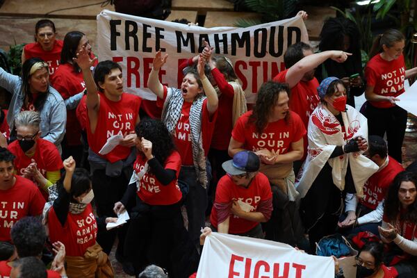 Demonstrators from the group, Jewish Voice for Peace, protest inside Trump Tower in support of Columbia graduate student Mahmoud Khalil, Thursday, March 13, 2025, in New York. (AP Photo/Yuki Iwamura)