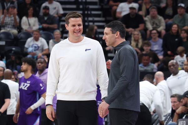 Utah Jazz head coach Will Hardy, left, speaks with Oklahoma City Thunder head coach Mark Daigneault after an NBA basketball game, Friday, April 11, 2025, in Salt Lake City. (AP Photo/Rob Gray)