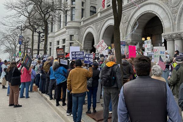 Supporters of Judge Hannah Dugan protest outside the United States Federal Building and Courthouse in Milwaukee, Wis. on Thursday, April 15, 2025 ahead of Dugan's arraignment on charges that she helped a man in the country illegally evade arrest by immigration authorities. (AP Photo/Todd Richmond)