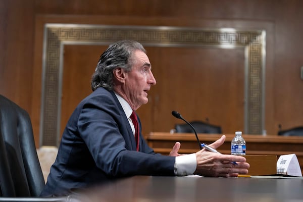 Former Gov. Doug Burgum, President-elect Donald Trump's choice to lead the the Interior Department as Secretary of the Interior, testifies before the Senate Energy and Natural Resources Committee on Capitol Hill in Washington, Thursday, Jan. 16, 2025. (AP Photo/Jose Luis Magana)